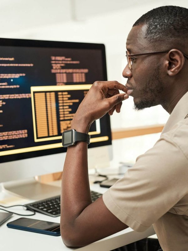 Software Engineer Reading Programming Code