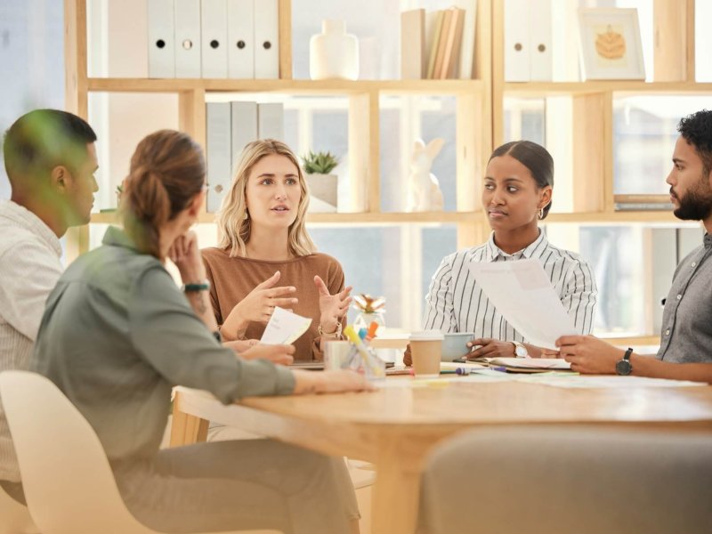 Planning, coaching and strategy with business people in meeting for development, project management